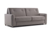 Il divano si caratterizza per le forme semplici e rigorose e per lo schienale svasato