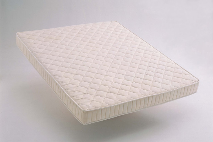 Latex mattress with different comfort zones