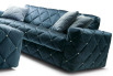 Square velvet cushion on the sofa from the same collection