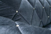 Detail of the tufted cover with nickel-plated iron buttons.