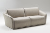 The sofa is characterised by a compact seat with one-piece cushions