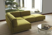 Dennis corner model composed of corner element + two single elements + an ottoman with casters