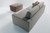 Duke 2-seater sofa bed combined with the same-name ottoman.