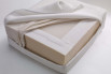 Detail of the mattress inner structure - foam and polyurethane sheet with fabric underlining and padding