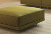 Dennis hassock with casters is available in fabric, leather and eco-leather.