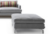 Sofa footstool with chromed metal legs